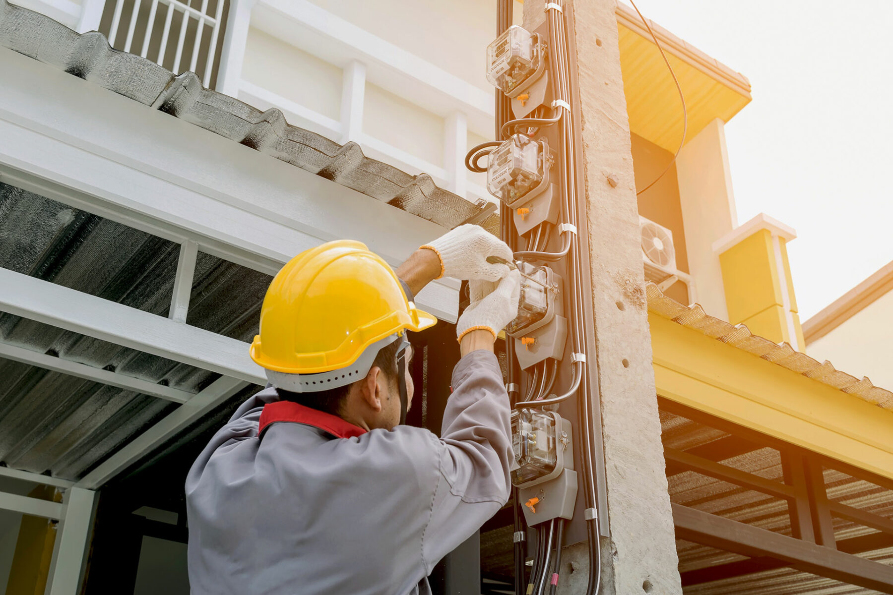 Man Performing Electrical Contracting Services